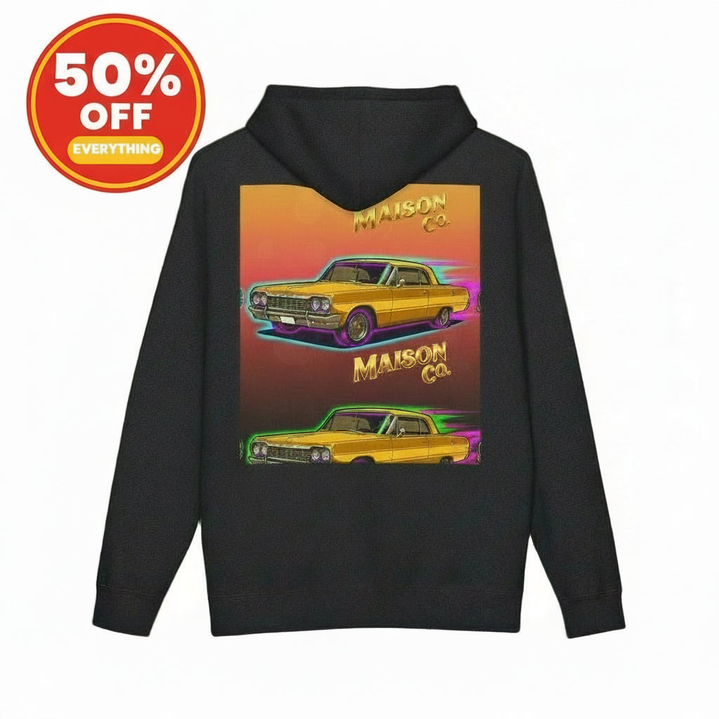 Black hoodie with a graphic of yellow cars and 'Maison Co.' text on the back, on a white background.